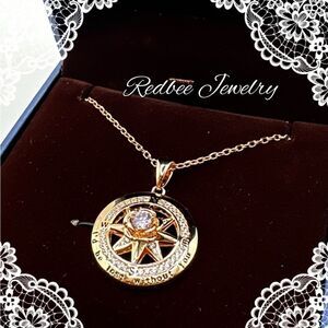 NIB Redbee 18kt GP, Yellow gold over s925, light purple CZ compass necklace!